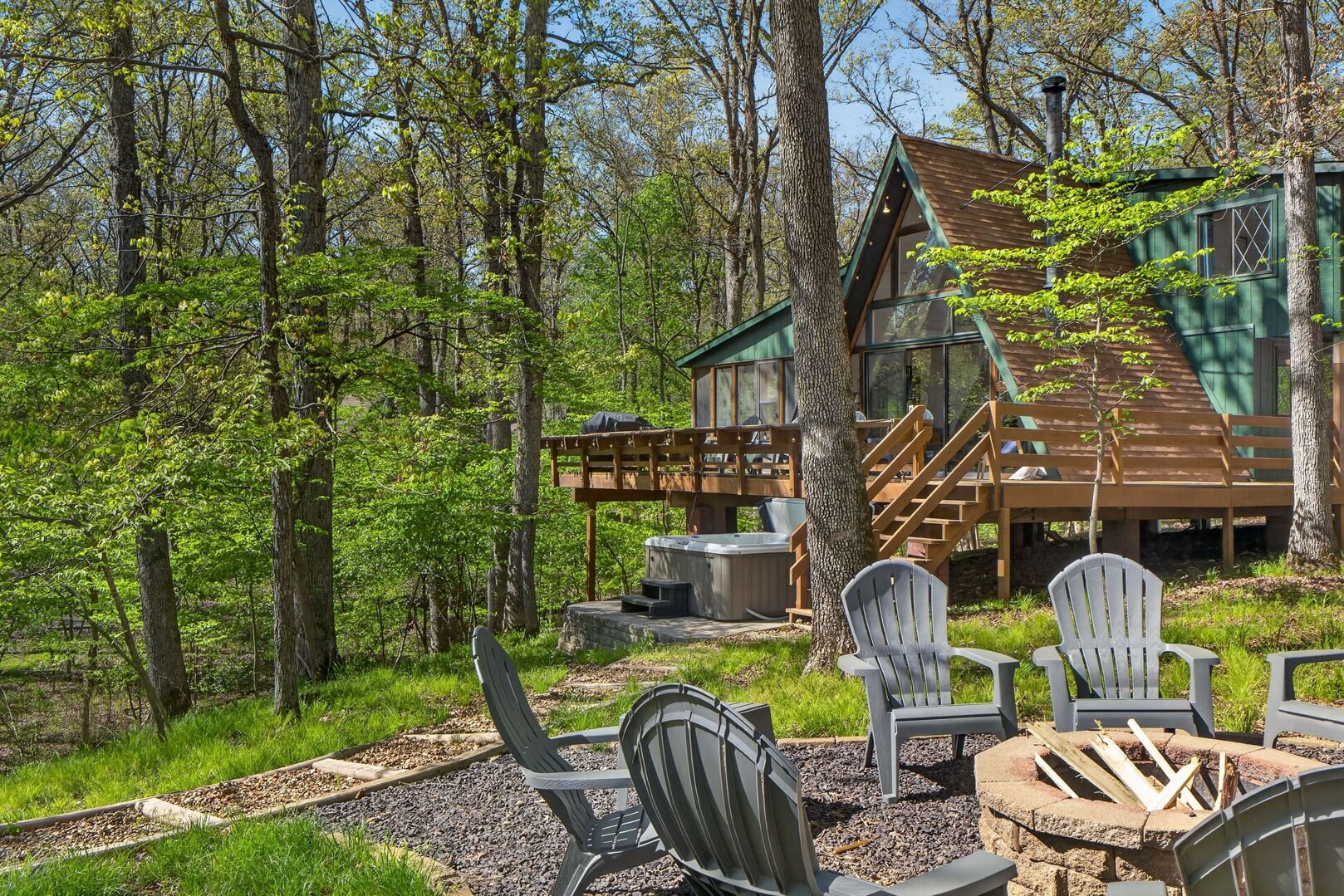 Innsbrook vacation rentals: Lakeside Hot Tub Chalet with hot tub deck and fire pit at Innsbrook Resort